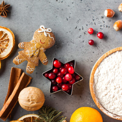 Christmas background with gingerbread and ginger cookie ingredients. Copy space. High quality photo